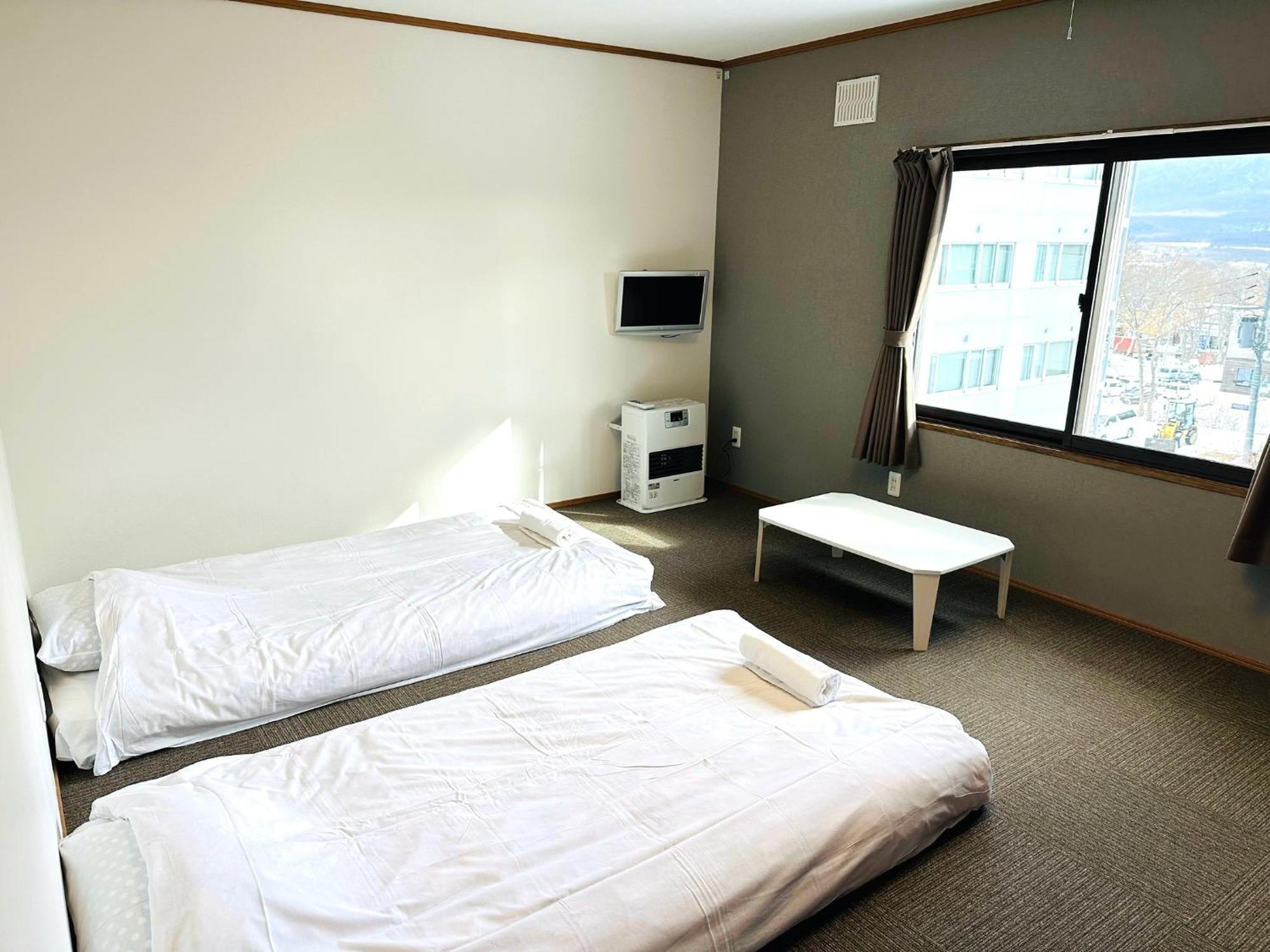 Pension Berg Niseko Buitenkant foto